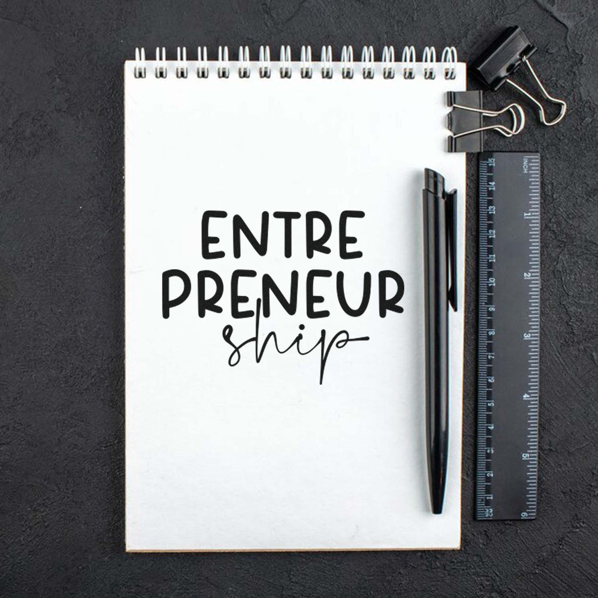 Entrepreneurship rubber stamp impression on a notebook page, ideal for business branding, planners, and custom stamp use.