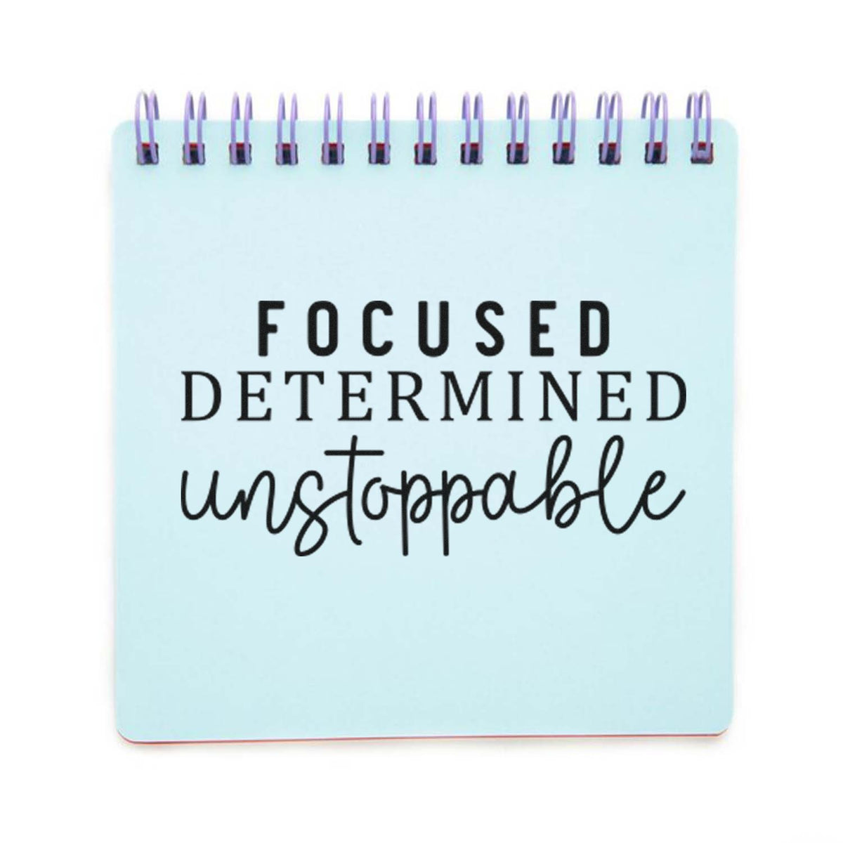 Focused Determined Unstoppable Serif Lettering PSI Pre-Inked Stamp imprint stamped in black ink. The words "Focused determined unstoppable" stack in spaced capitals, serif capitals, and script.