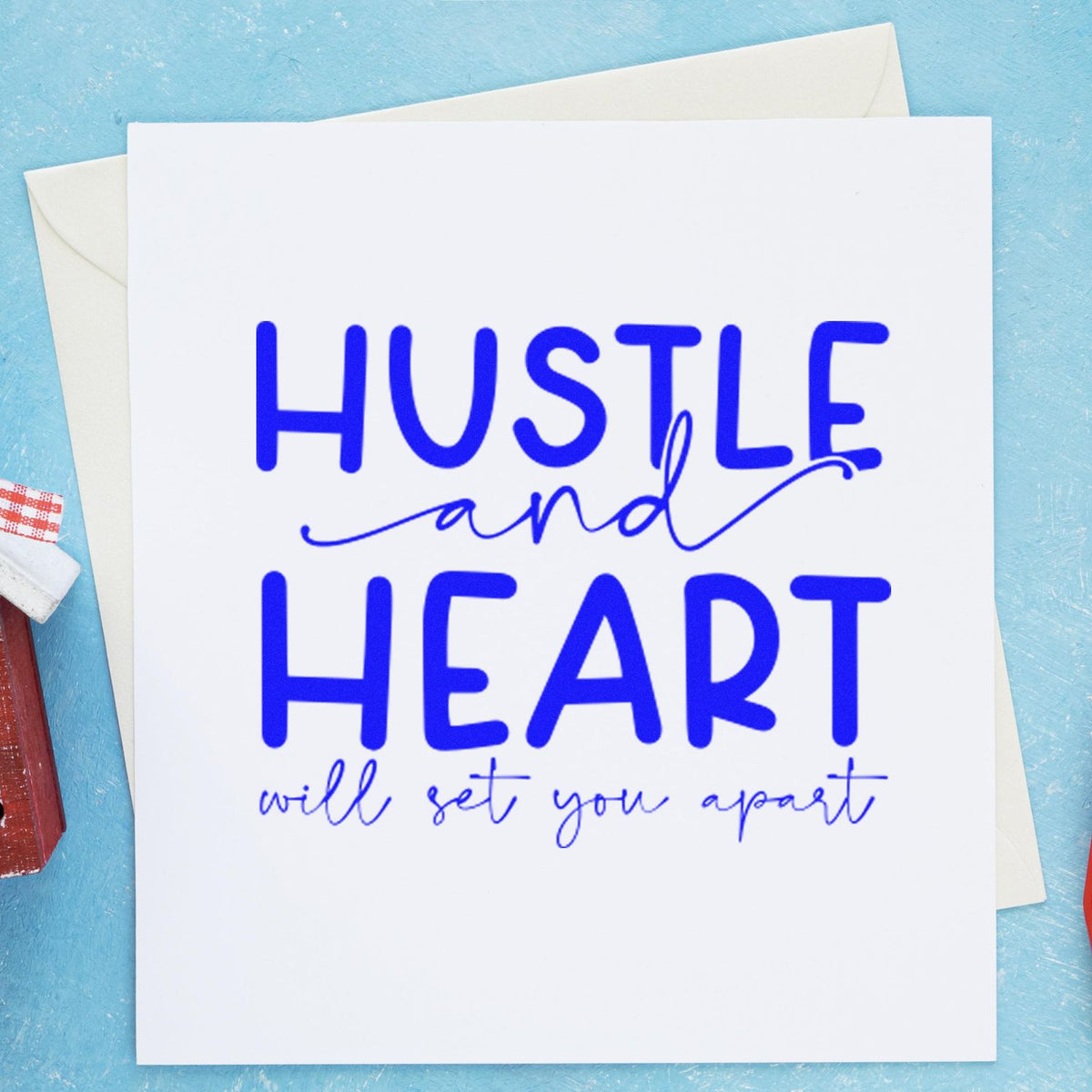Motivational custom rubber stamp reading Hustle and Heart Will Set You Apart on a white card, perfect for stationery.