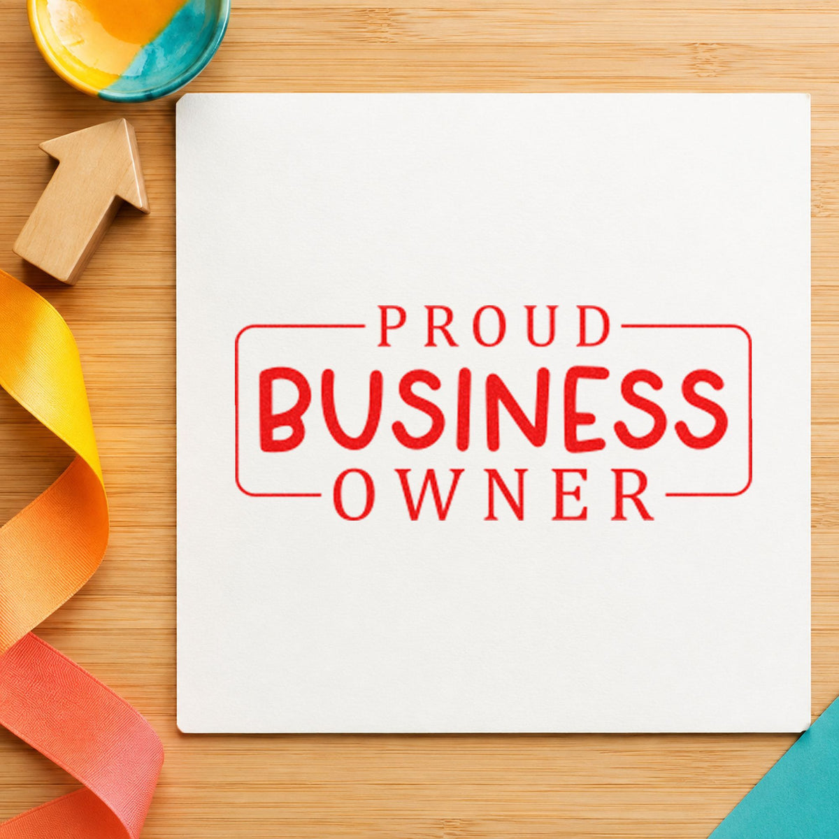 Proud Business Owner Frame craft stamp imprint in red ink on a handmade project, one idea being loyalty punch cards.
