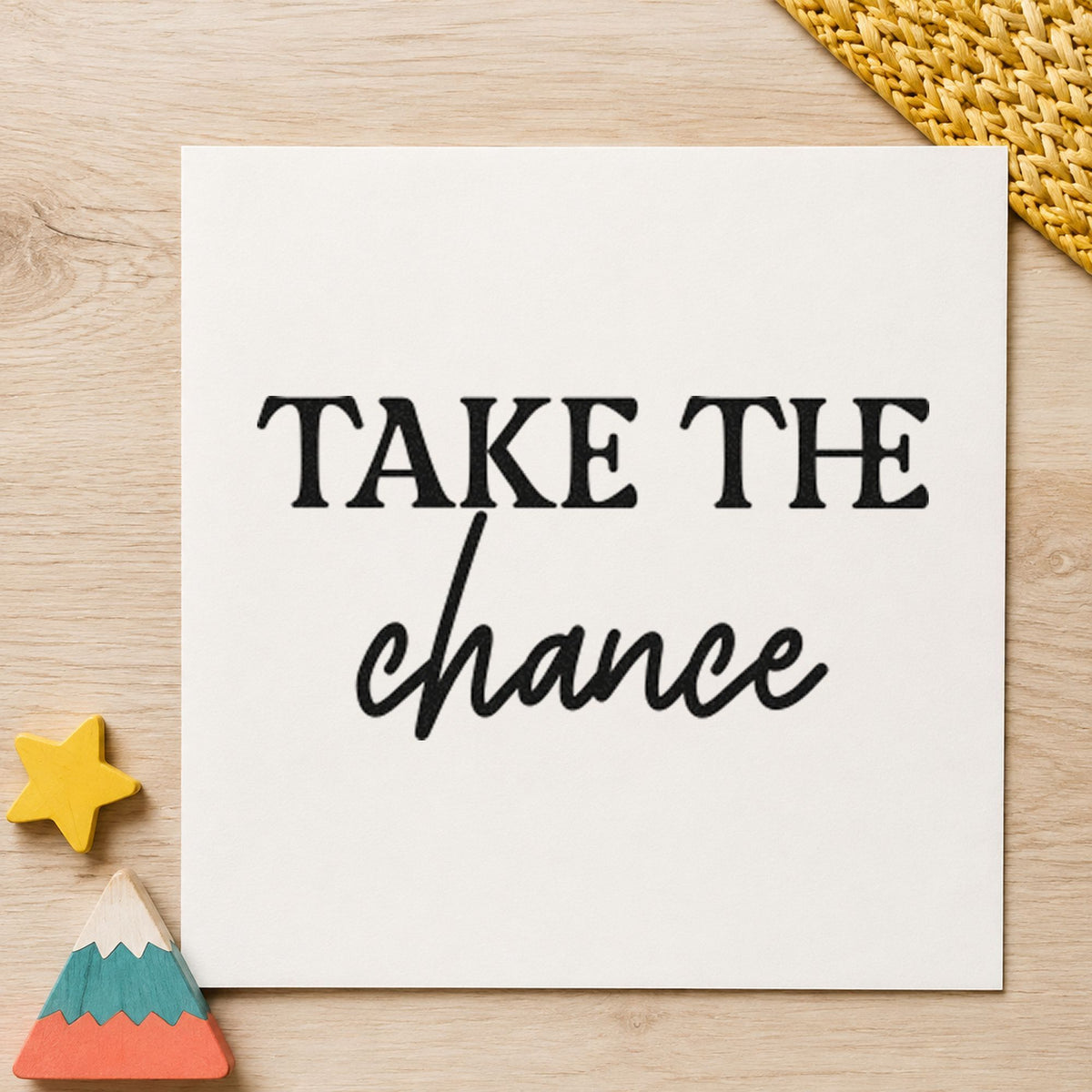 Take The Chance Lettering craft stamp imprint in black ink on a handmade project, one idea being merch bundle gift tags.
