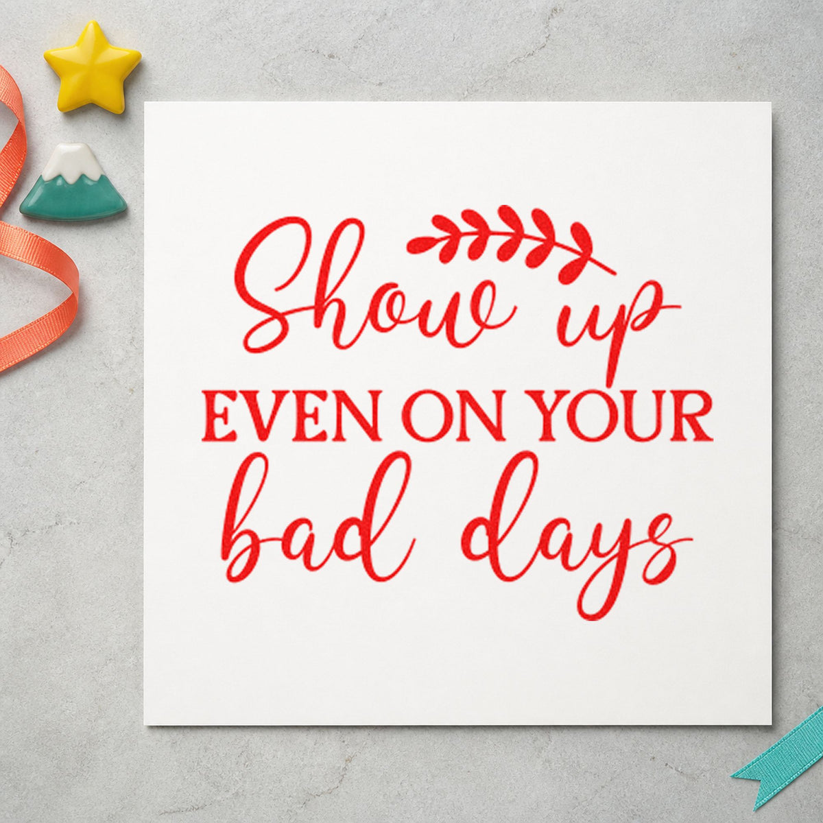 Show Up On Bad Days craft stamp imprint in red ink on a handmade project, one idea being prompt draw cards.