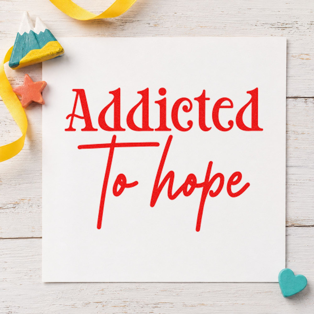 Addicted To Hope Lettering craft stamp imprint in red ink on a handmade project, one idea being pattern note cards.