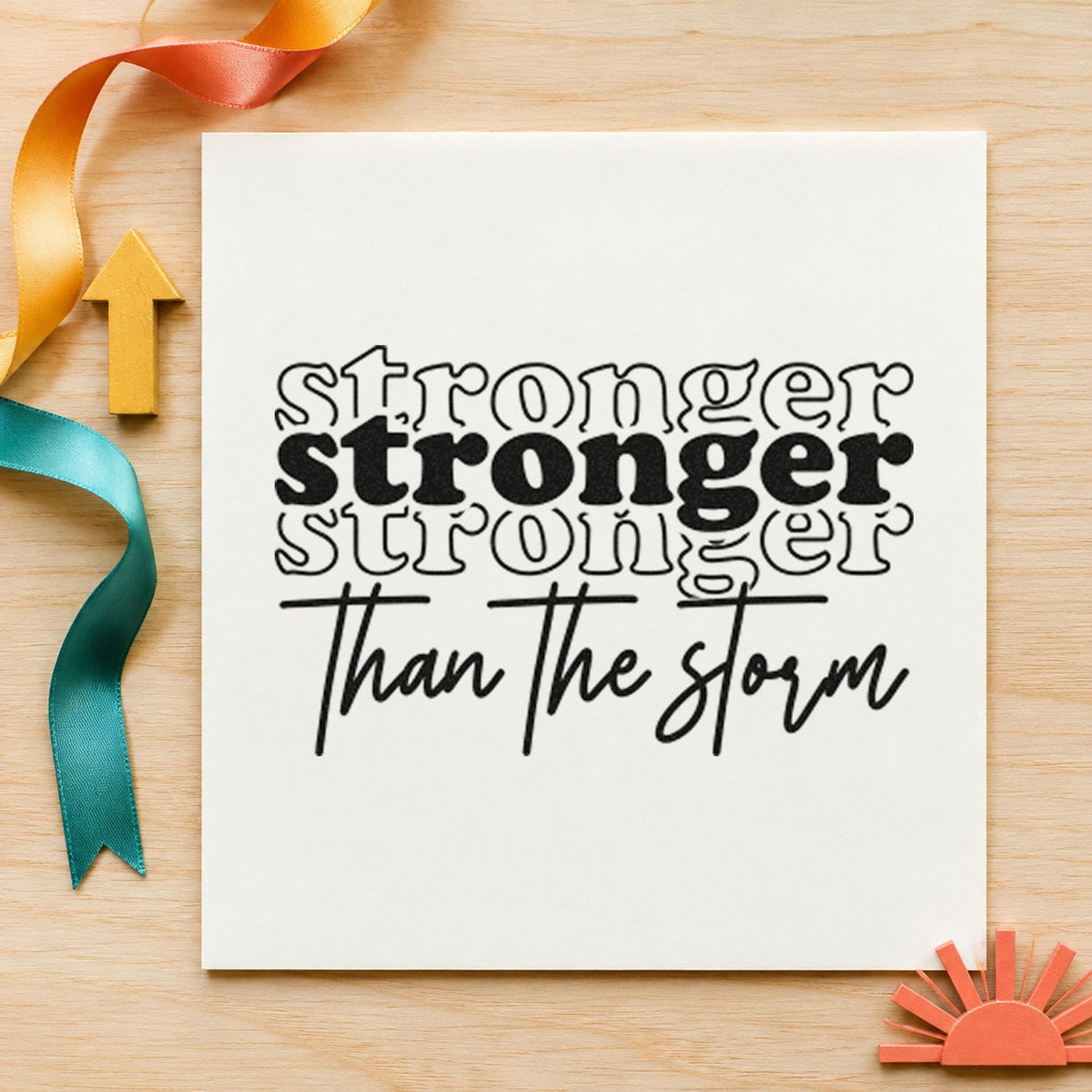 Wood Handle Stronger Than The Storm Repeated Script Lettering Rubber Stamp in use 10