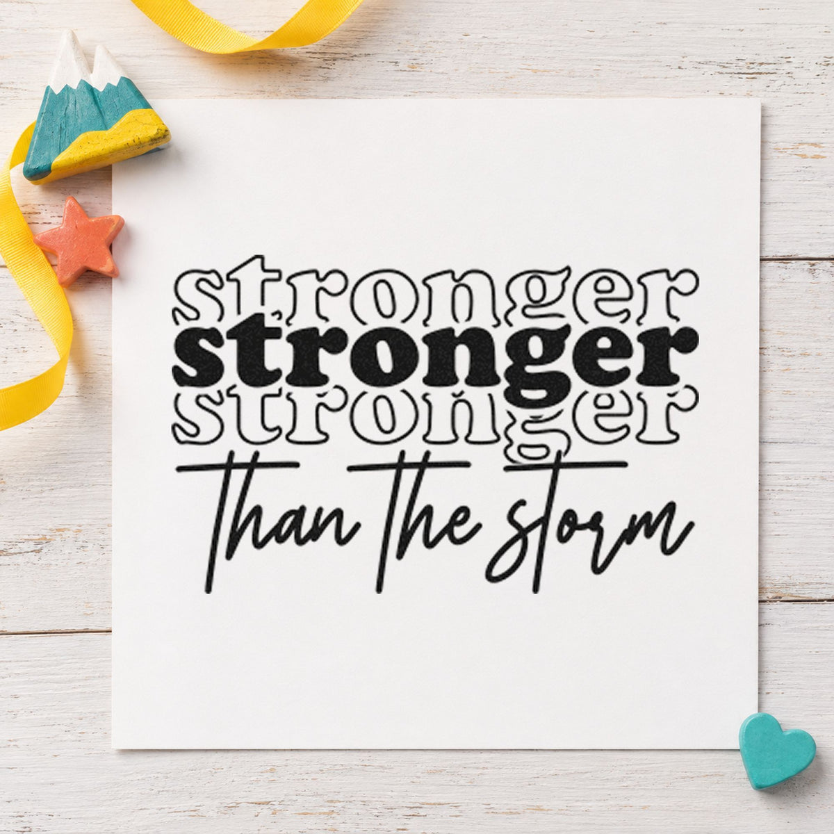 Wood Handle Stronger Than The Storm Repeated Script Lettering Rubber Stamp in use 3