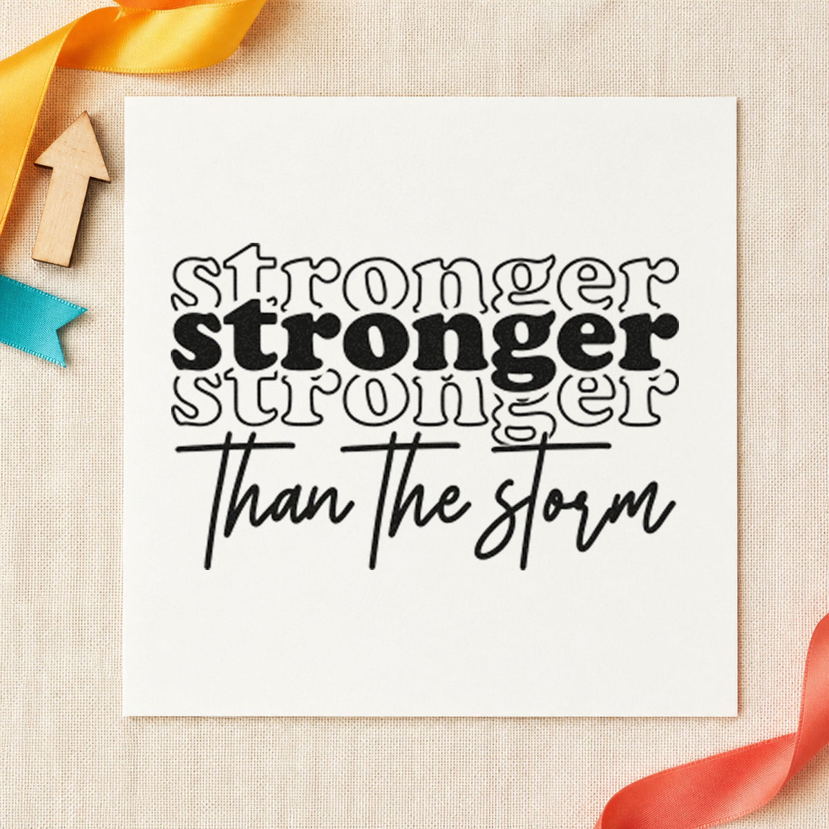 Wood Handle Stronger Than The Storm Repeated Script Lettering Rubber Stamp in use 4