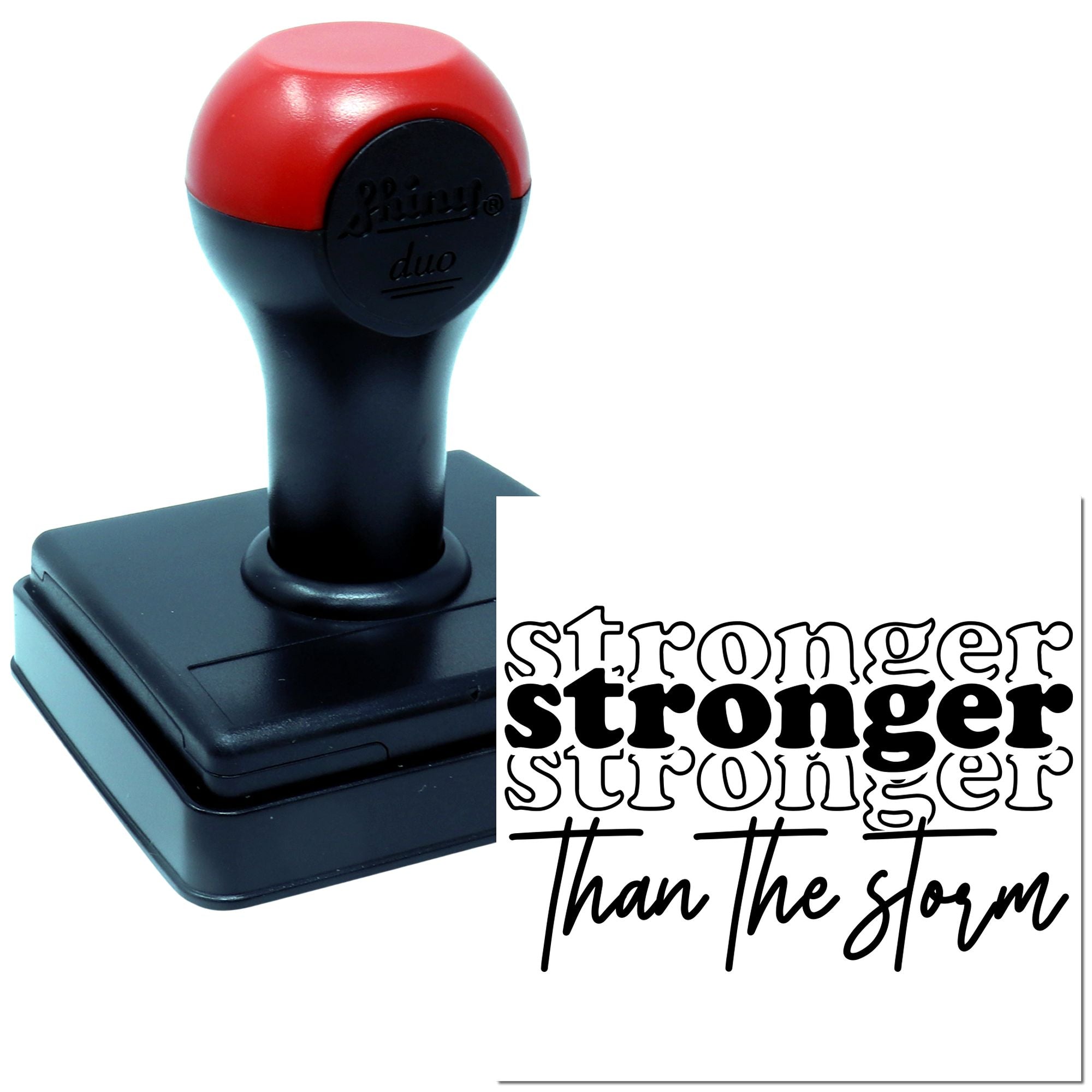 Custom self-inking rubber stamp with Stronger Than the Storm design for motivational crafting and branding.