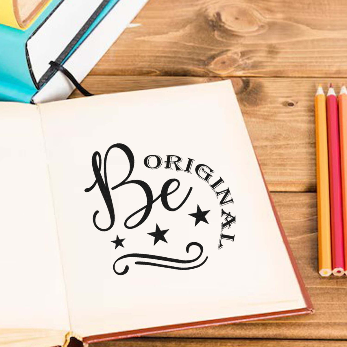 Be Original rubber stamp design on an open notebook for DIY crafting, journaling, and personalized stationery.