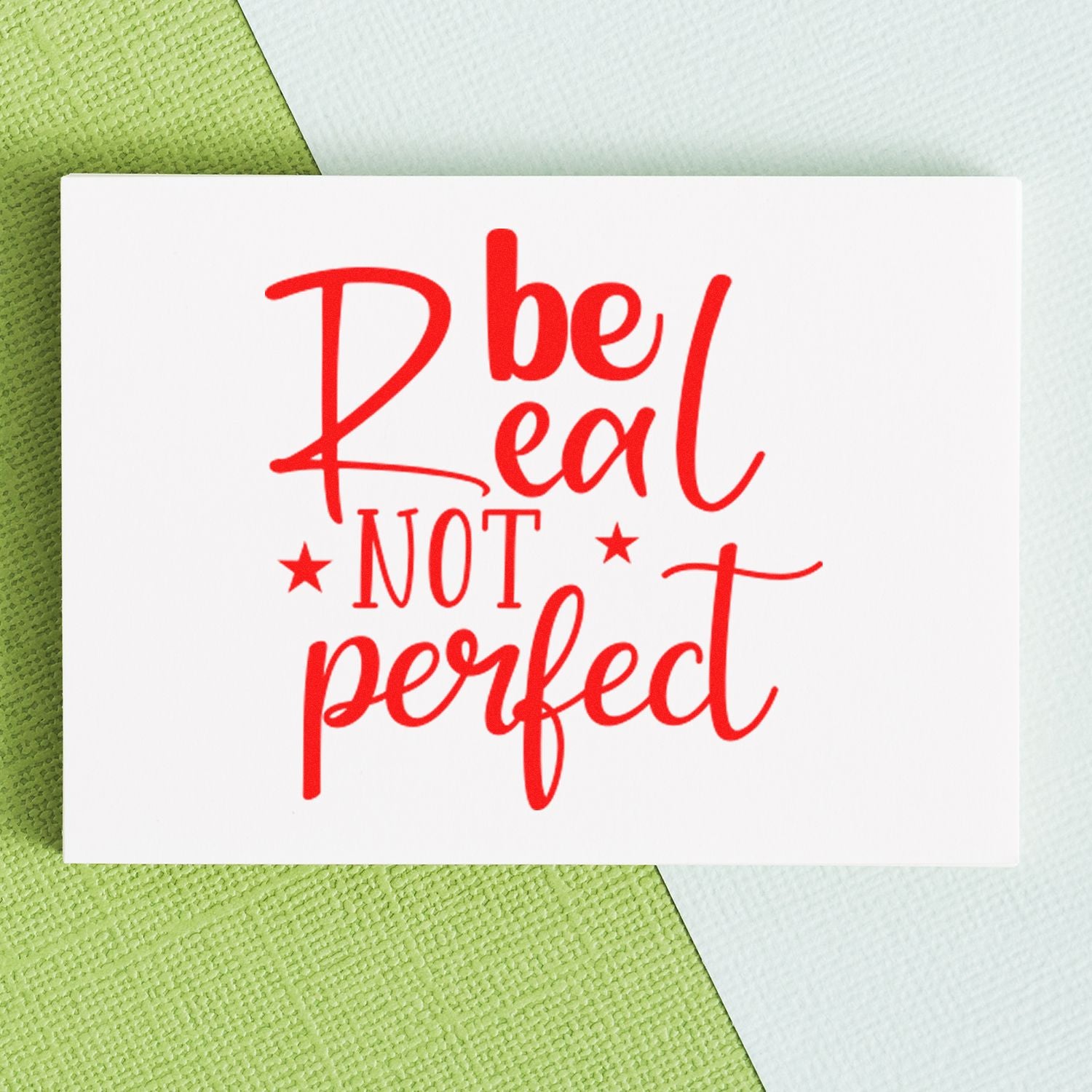 Custom rubber stamp with Be Real Not Perfect in bold red, perfect for motivational crafts, journaling, and handmade cards.