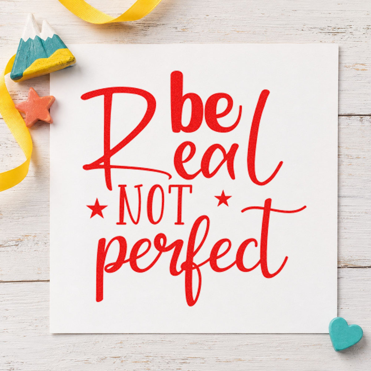 Be Real Not Perfect Stars craft stamp imprint in red ink on a handmade project, one idea being layout idea cards.