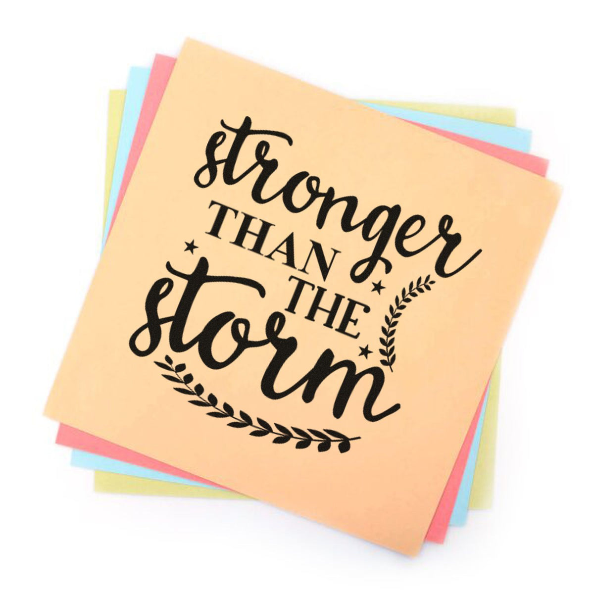 Inspirational rubber stamp design reading Stronger Than the Storm with leafy accents on pastel paper for encouragement crafts.