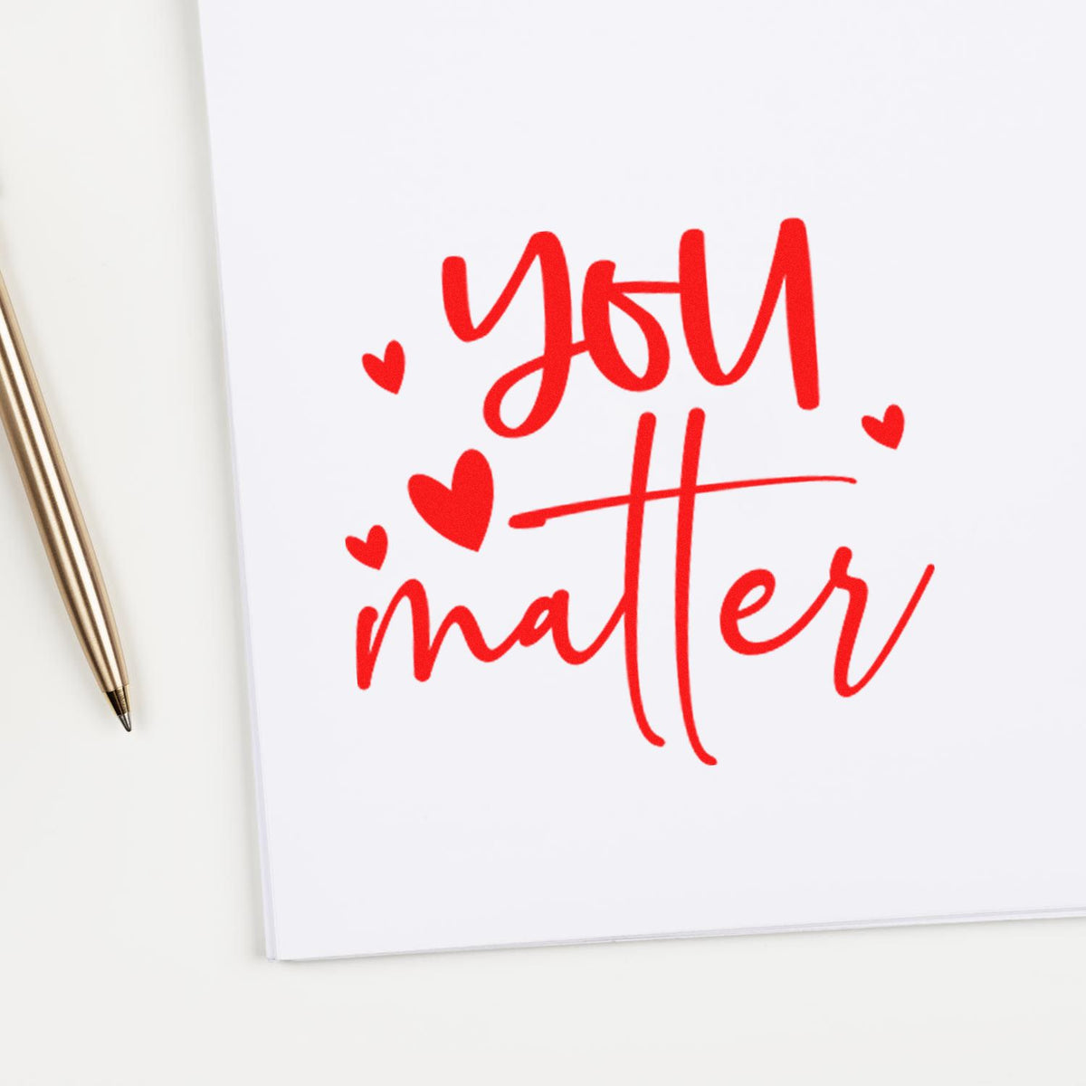 You matter motivational rubber stamp design in red with hearts, perfect for uplifting notes, cards, and gift packaging.