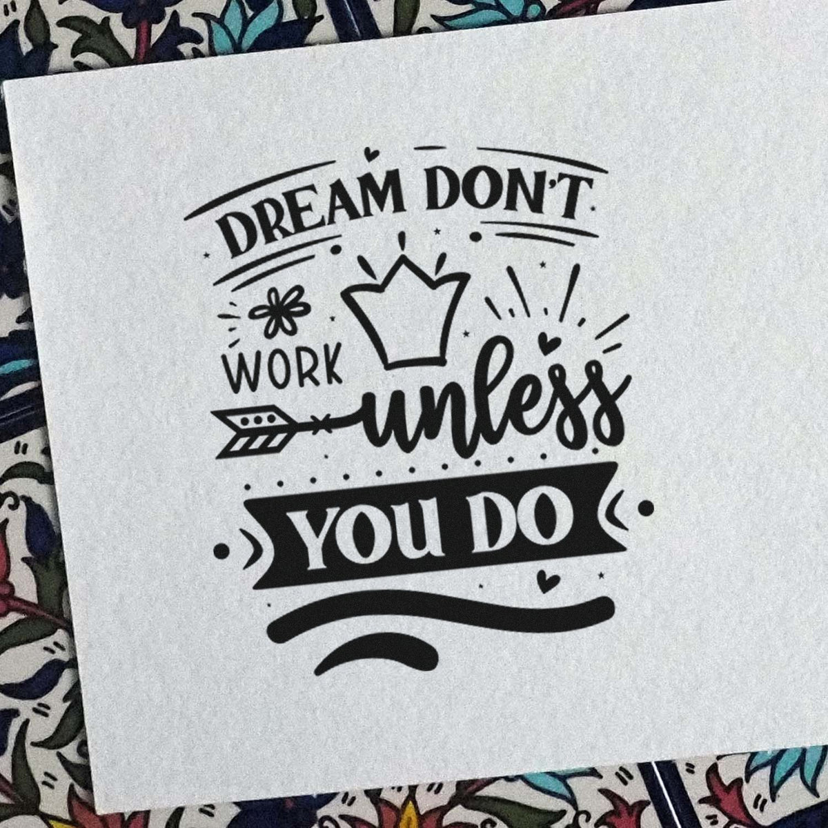 Motivational rubber stamp design with Dream dont work unless you do quote for crafting, journaling, and branding.