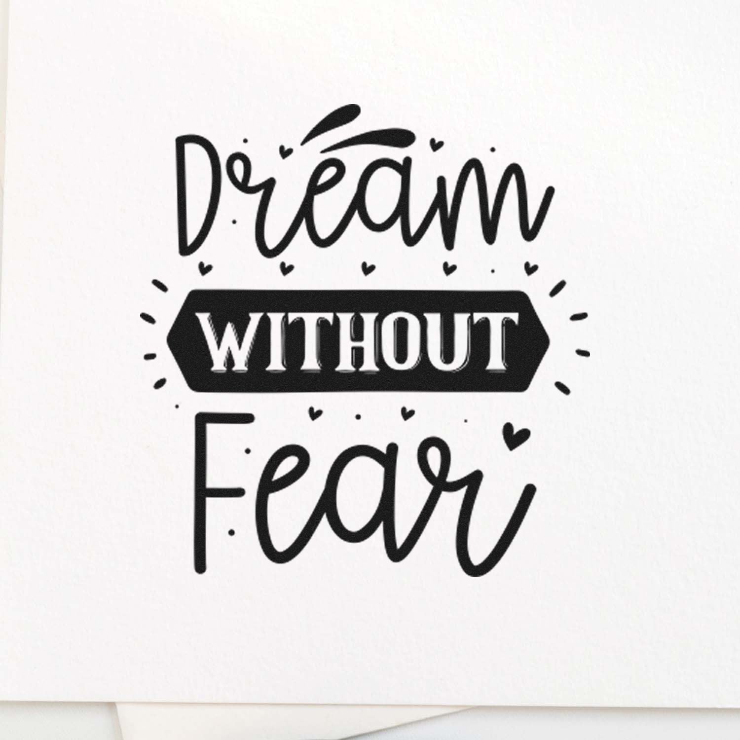 Dream Without Fear motivational rubber stamp design with hand-lettered text and heart accents.