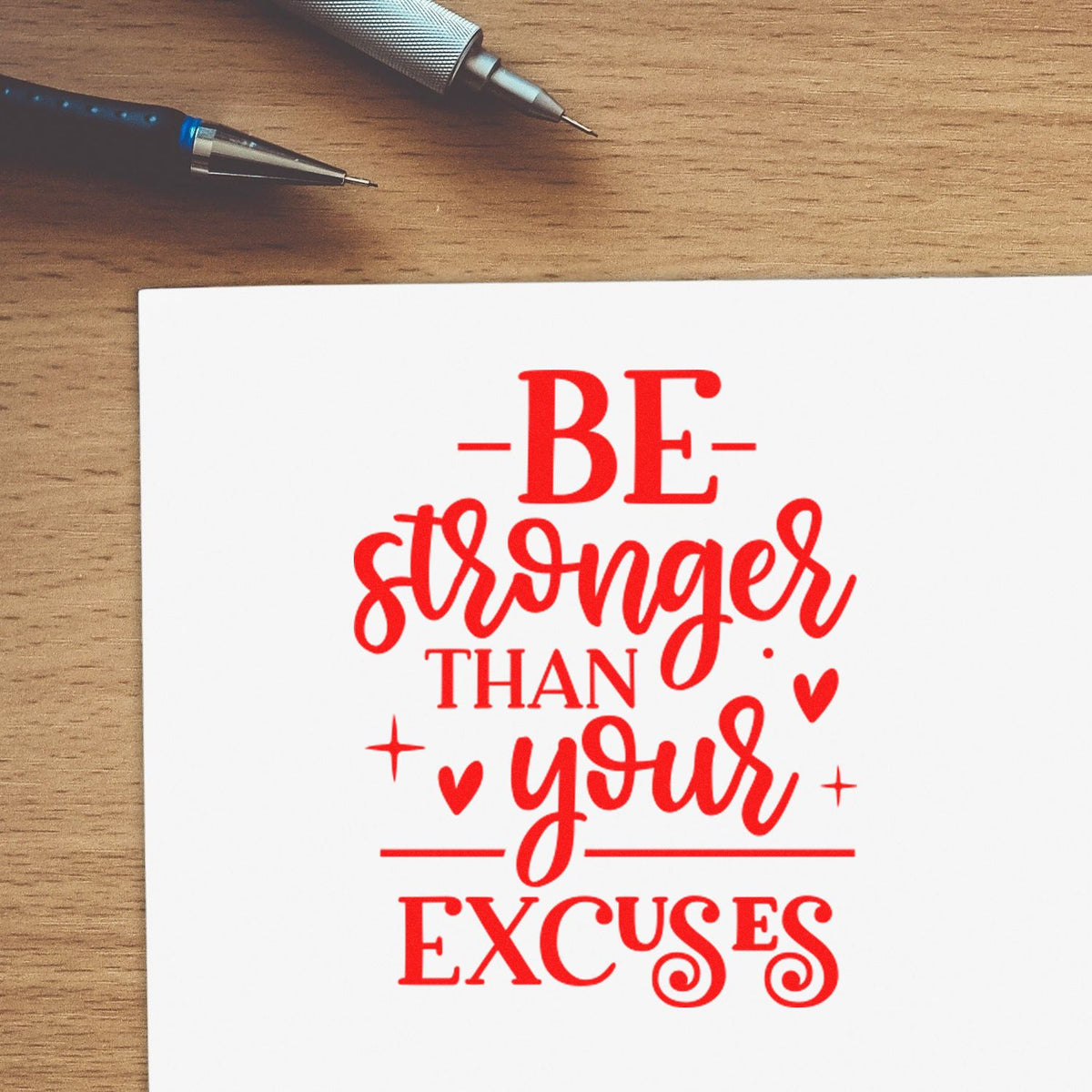 Motivational rubber stamp design reading Be stronger than your excuses in red for journaling, planners and crafts.