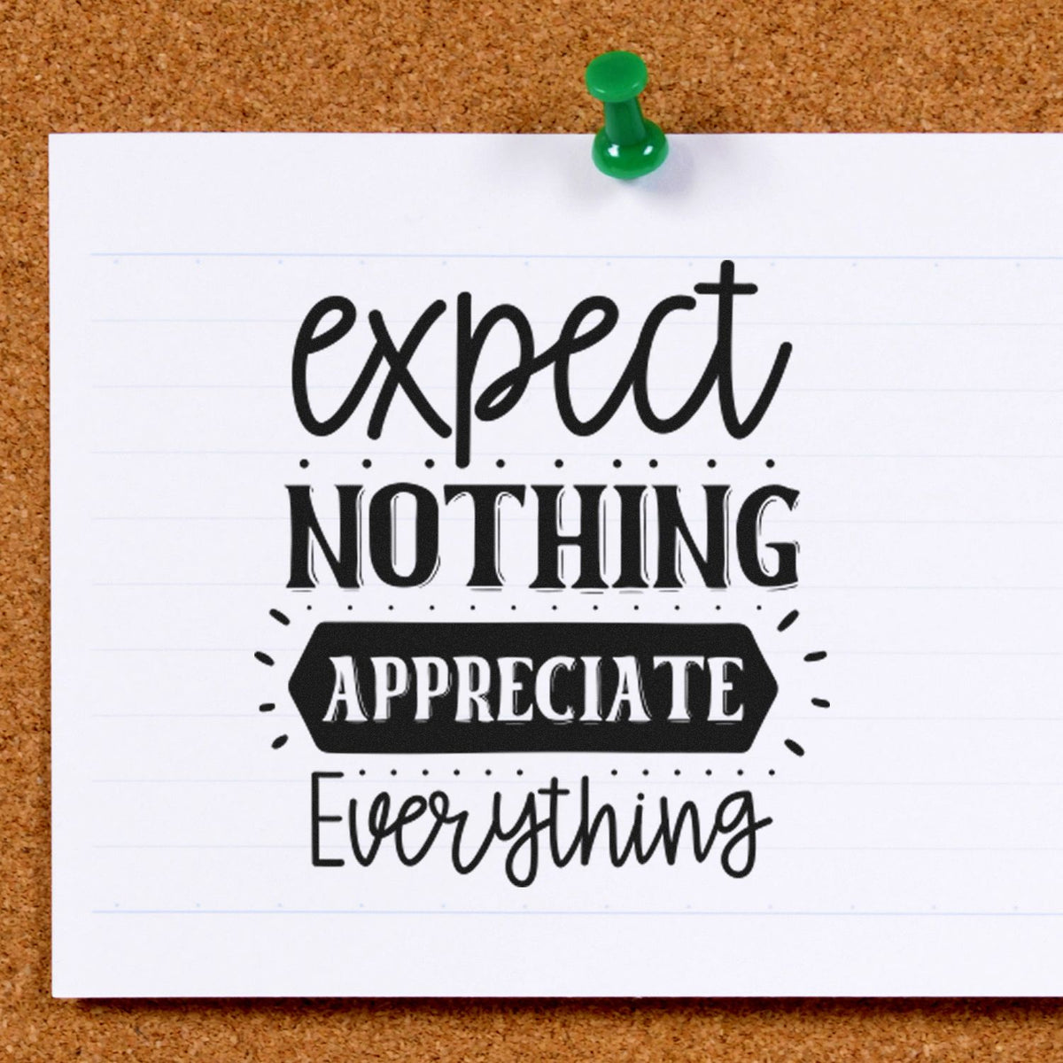 Expect Nothing Appreciate Everything PSI Pre-Inked Stamp imprint stamped in black ink. The words "expect nothing appreciate everything" appear with a dark banner, dots, and rays.