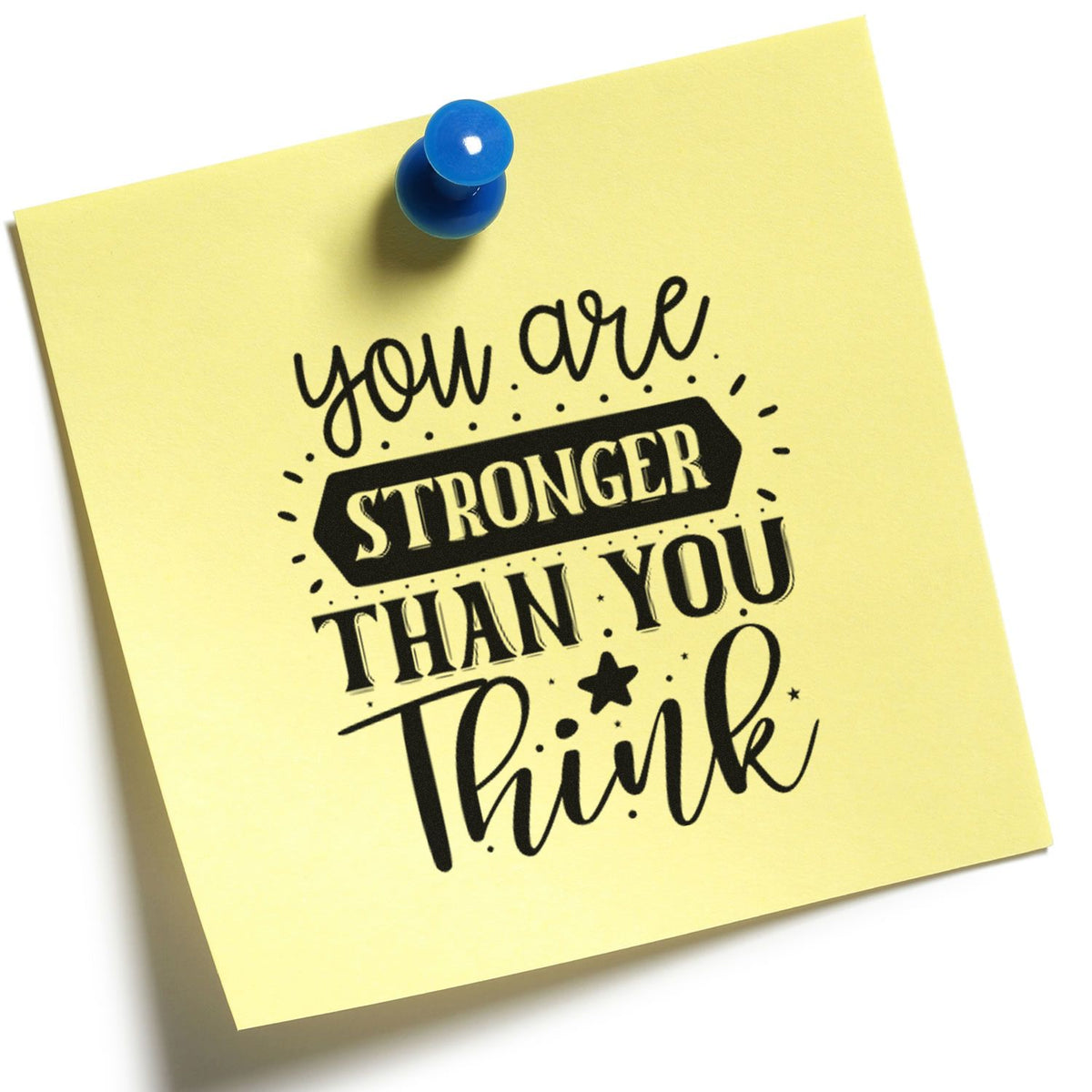 You Are Stronger Than You Think With Stars Slim Pre-Inked Stamp imprint stamped in black ink. The phrase "you are stronger than you think" includes a dark banner, solid star, dots, and rays.