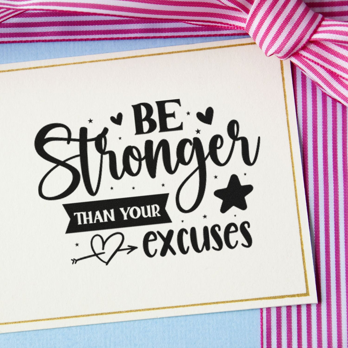 Motivational rubber stamp with Be Stronger Than Your Excuses quote, hearts, and stars for cards and craft projects.