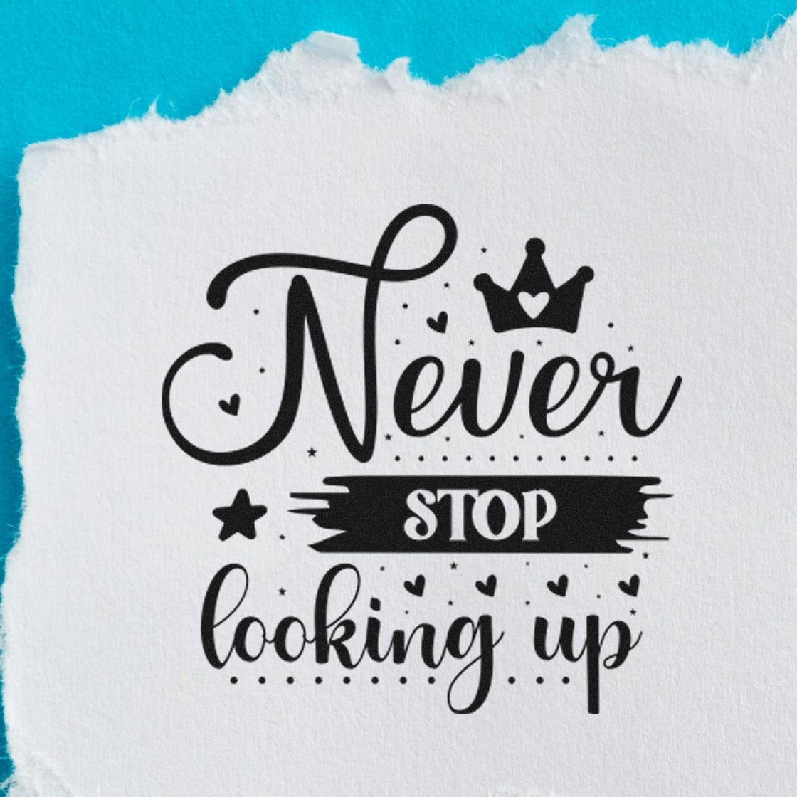 Inspirational rubber stamp design reading Never Stop Looking Up with crown, hearts, and stars in black ink.