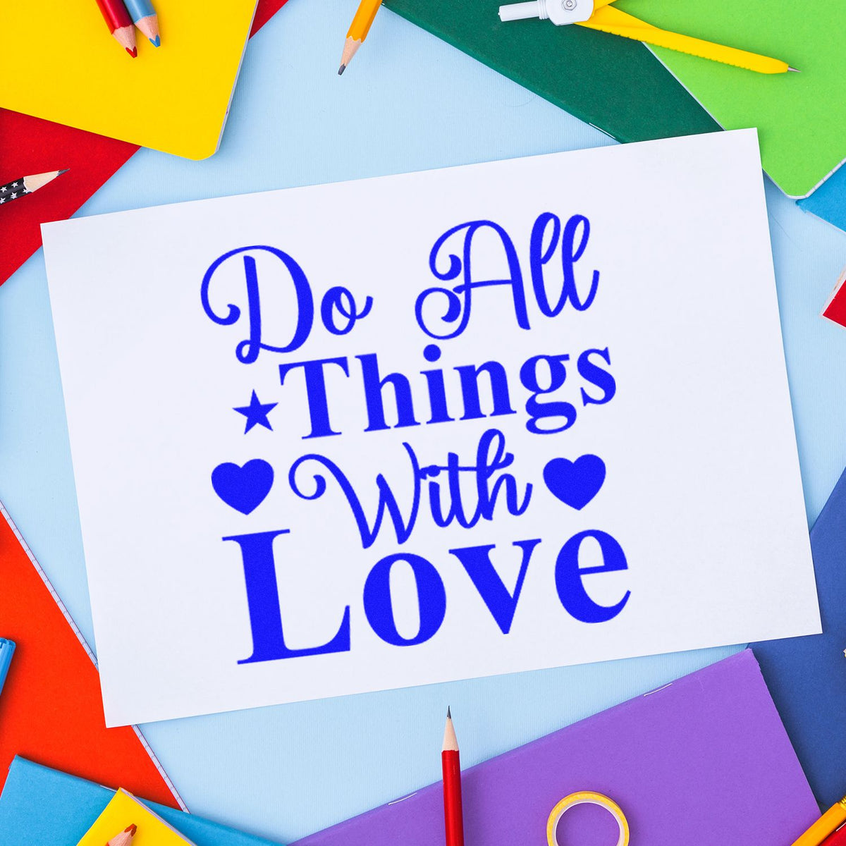 Rubber stamp design with Do All Things With Love quote in blue, ideal for crafts, planners, and school projects.