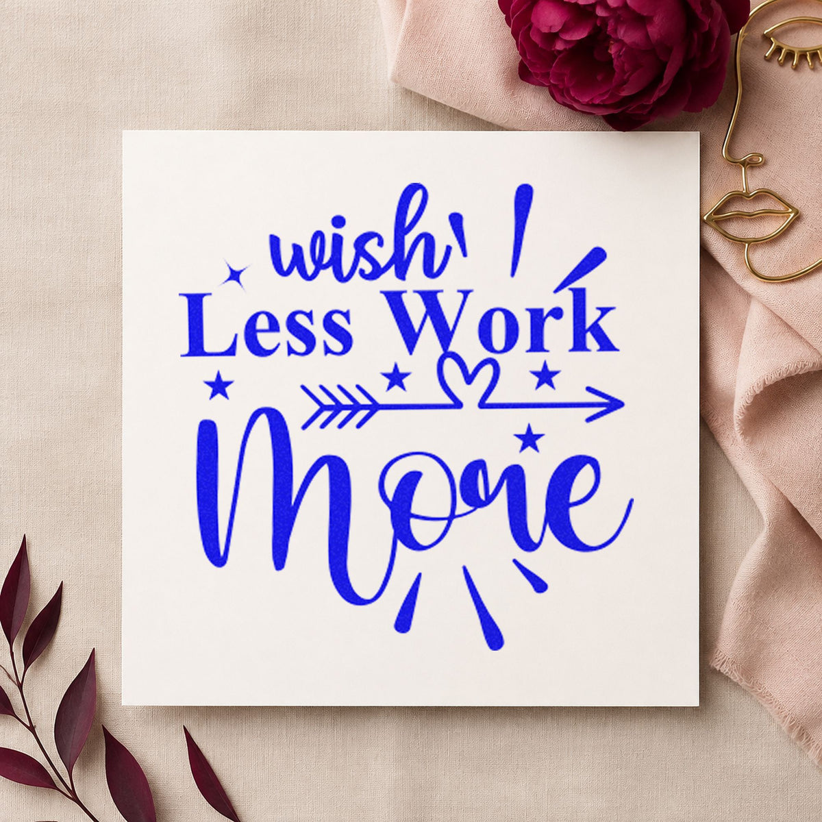Wish Less Work More Arrow craft stamp imprinted in blue ink on paper, a design suited to framed garage corner.