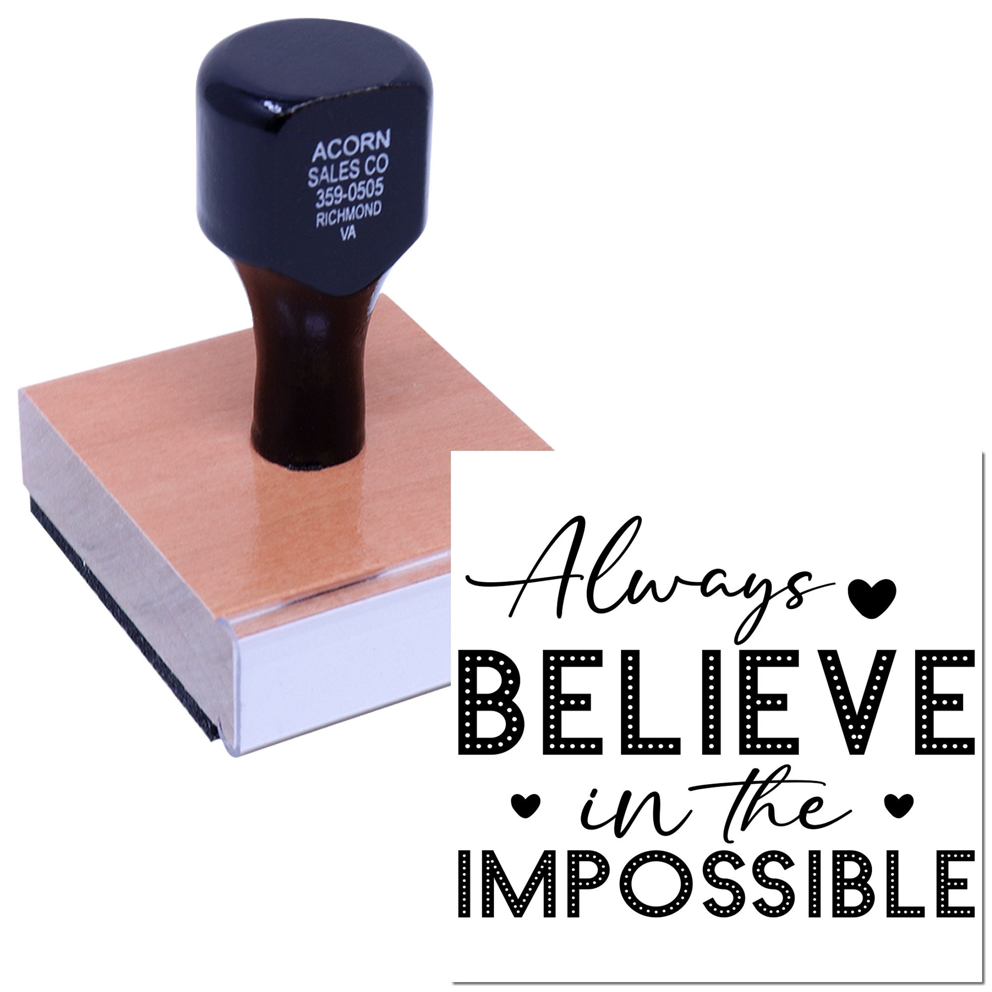Custom rubber stamp with Always Believe in the Impossible inspirational quote and heart design on a wooden stamp base.
