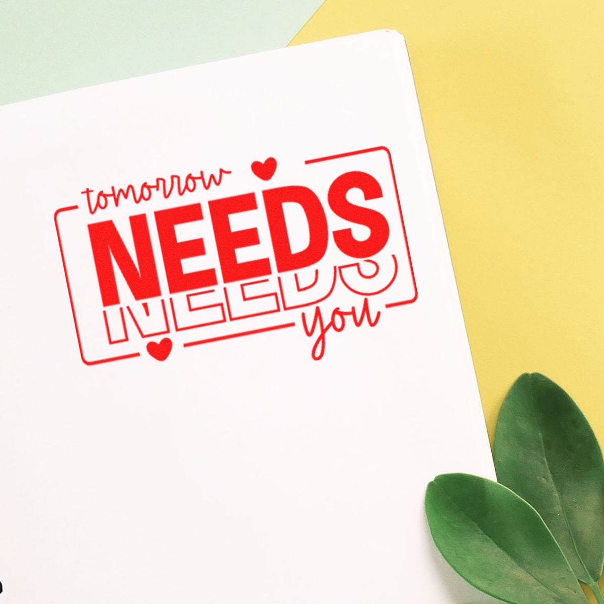 Red Tomorrow Needs You rubber stamp on white paper, ideal for inspirational handmade cards and stationery.