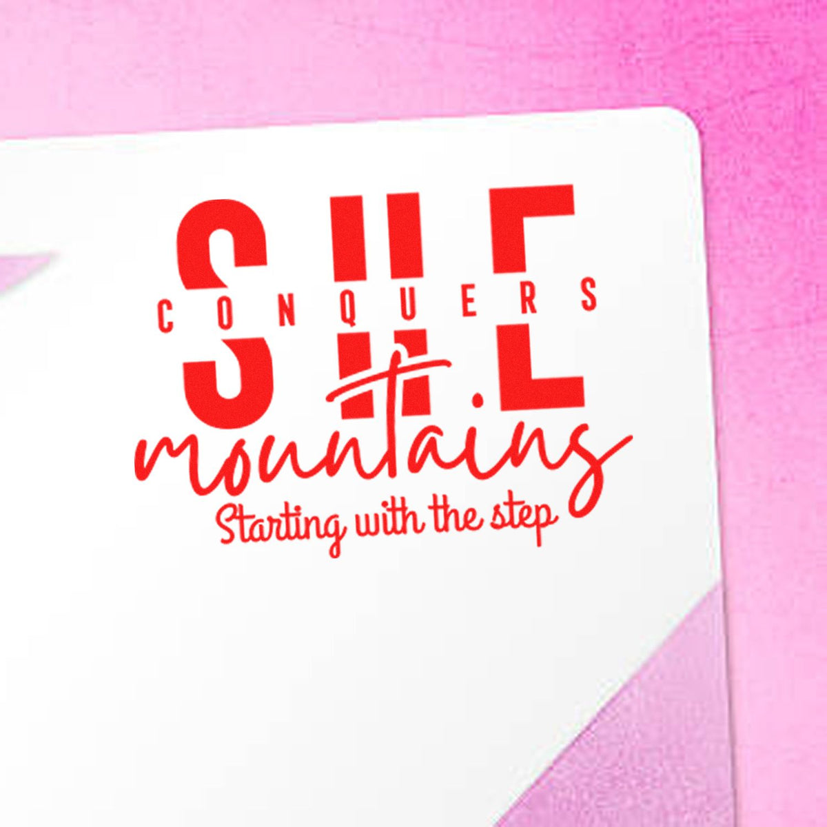 Custom motivational rubber stamp with red text: Conquer mountains, starting with the step.