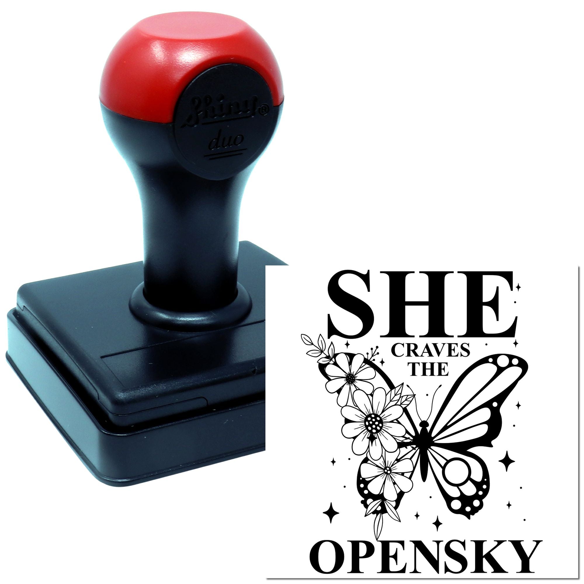 Self-inking rubber stamp with butterfly floral design reading She Craves the Open Sky for custom craft branding.