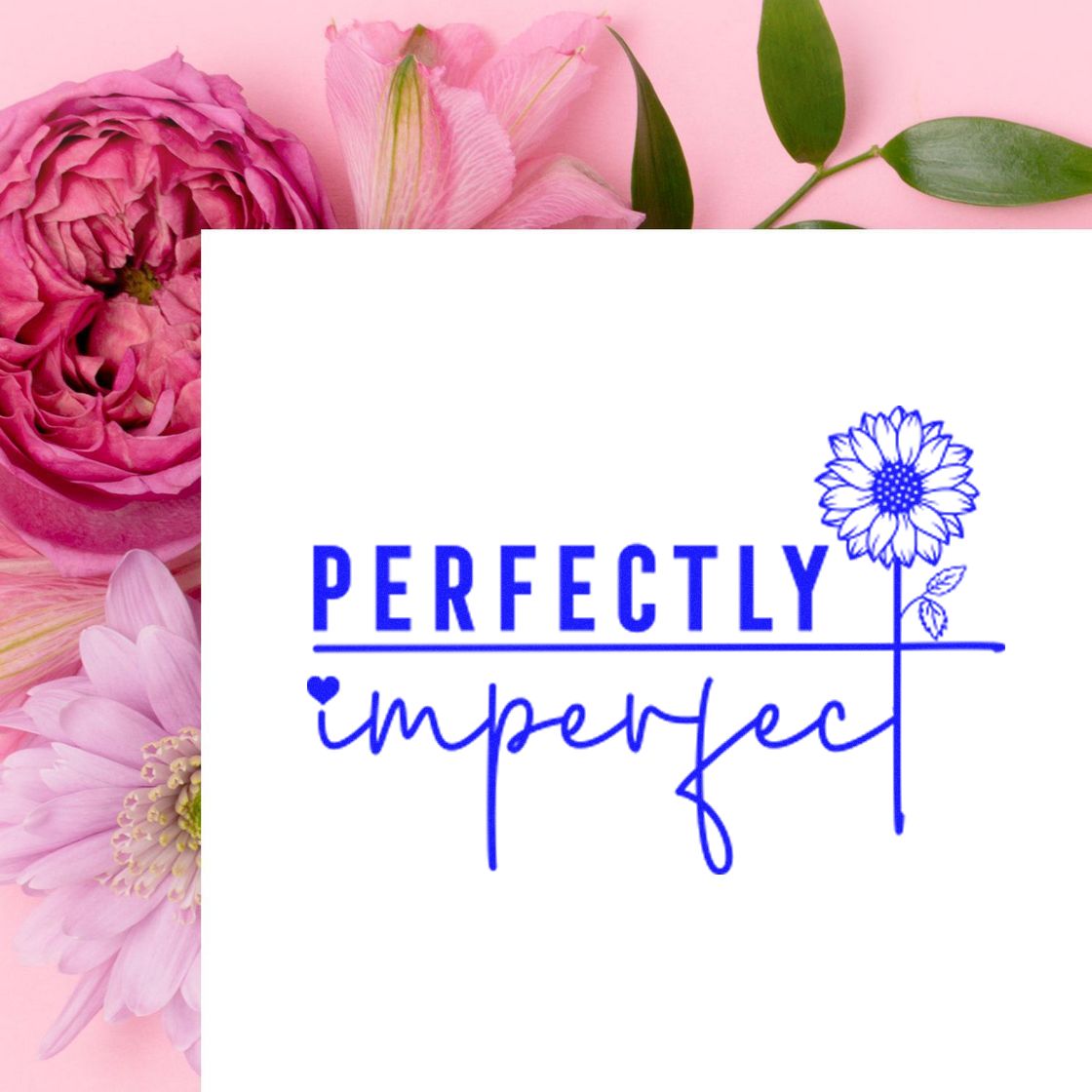 Perfectly Imperfect floral rubber stamp design with blue hand-lettered text and flower illustration on a pink background.