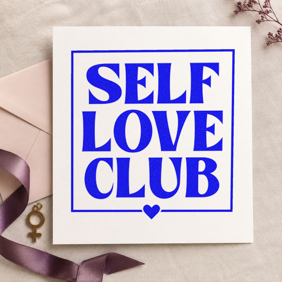 Self Love Club Frame craft stamp in blue ink on cardstock, an easy option for mat towel printing.