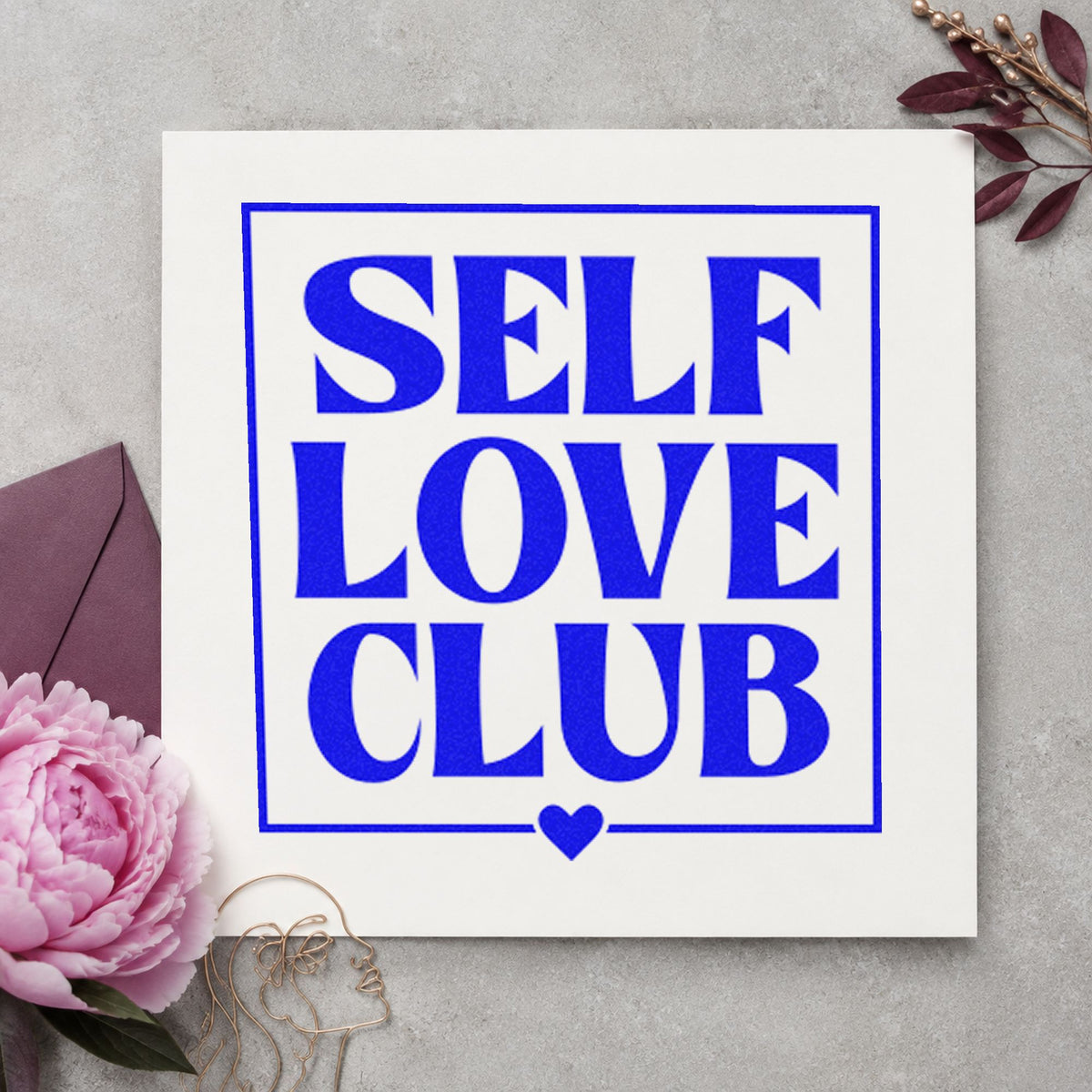 Self Love Club Frame craft stamp imprinted in blue ink on paper, a design suited to framed studio entry.