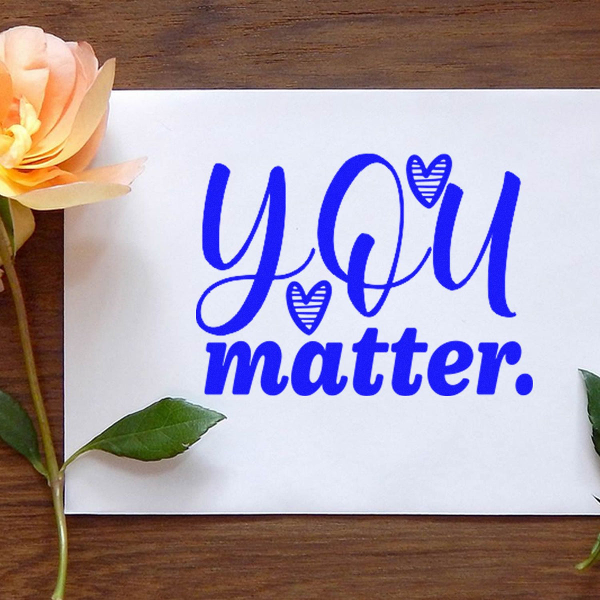 Blue custom rubber stamp reading You matter with hearts, perfect for handmade cards, crafts, and encouragement.