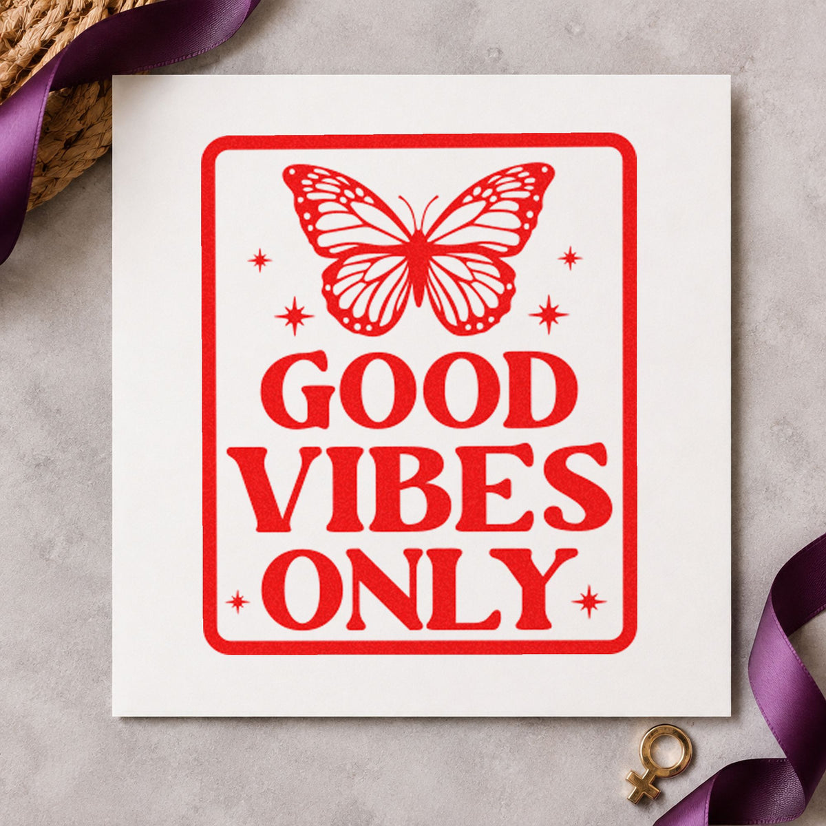 Good Vibes Only Butterfly rubber stamp shown in red ink, stamped for projects such as shelf book labels.