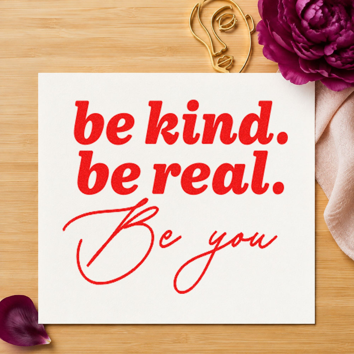 Be Kind Real You craft stamp imprint in red ink on a handmade project, one idea being shout out cards.