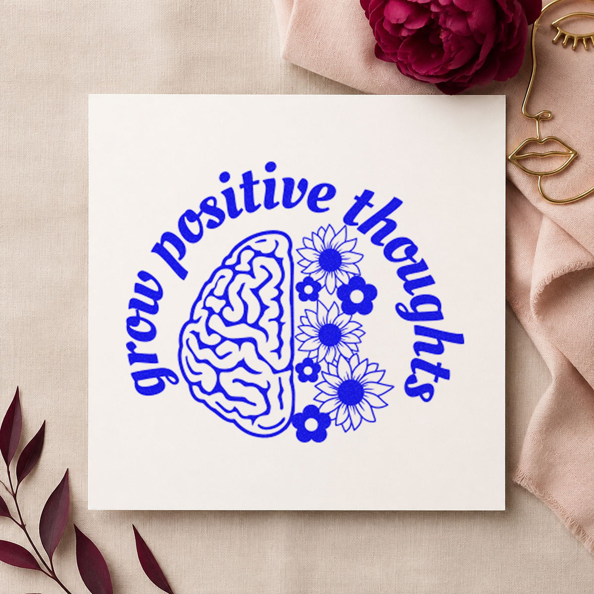 Grow Positive Thoughts Brain craft stamp in blue ink on cardstock, an easy option for mat strap printing.