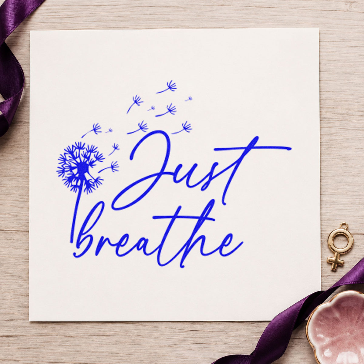 Just Breathe Dandelion Seeds craft stamp in blue ink on cardstock, an easy option for mask strap printing.