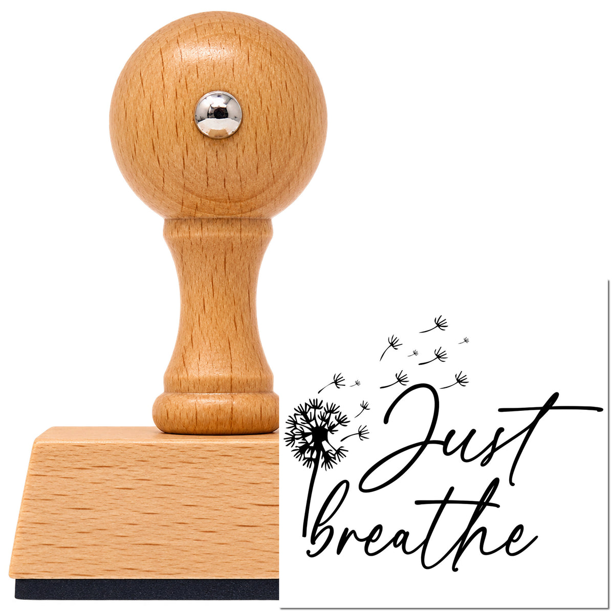 Just Breathe Dandelion Seeds Vintage Pro rubber stamp in European beech wood with a round knob handle, shown beside its black imprint.