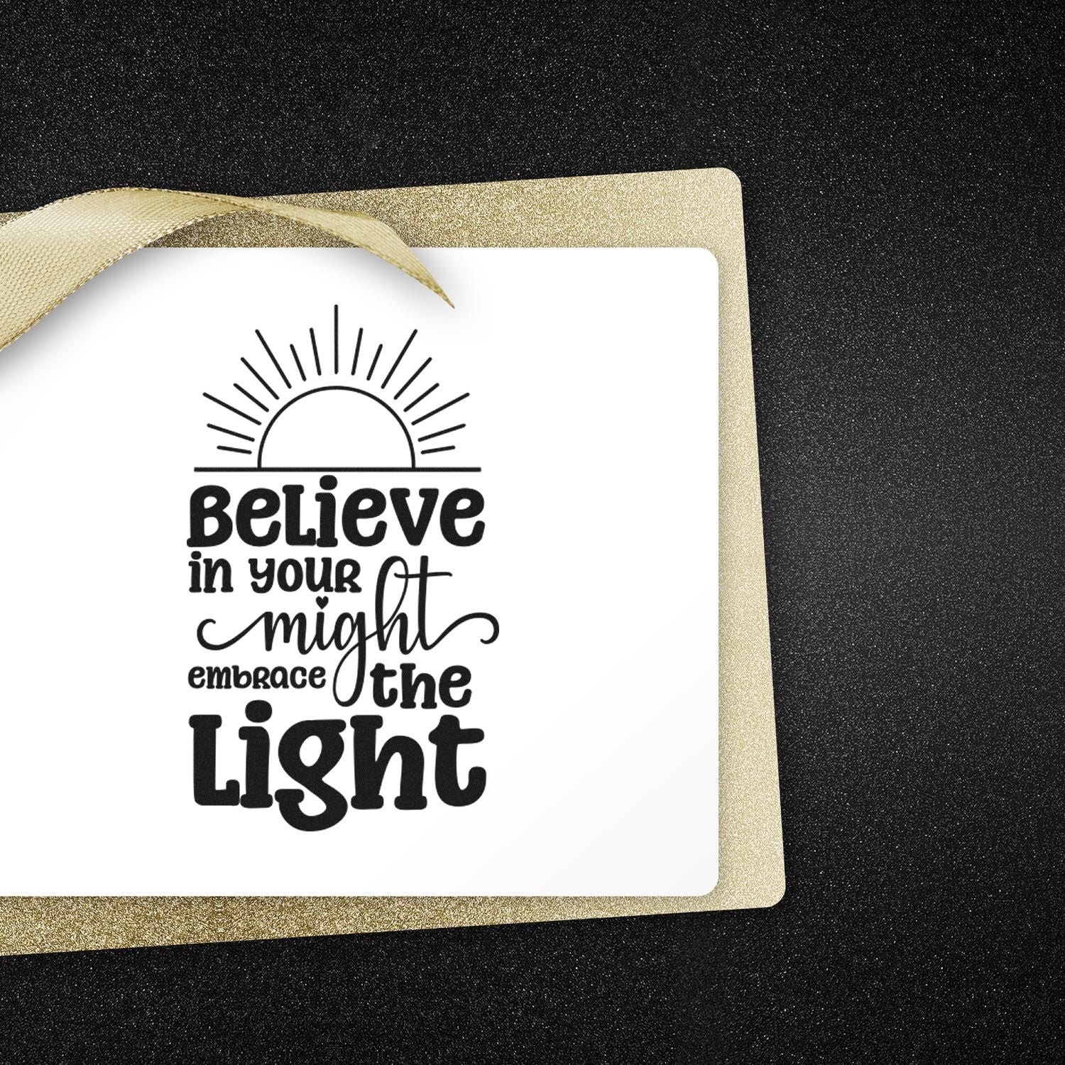 Inspirational rubber stamp with sunrise quote, "Believe in your might, embrace the light," for card making and crafts.