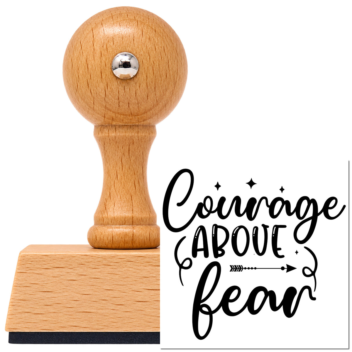 Courage And Fear Arrow Lettering Vintage Pro rubber stamp in European beech wood with a round knob handle, shown beside its black imprint.