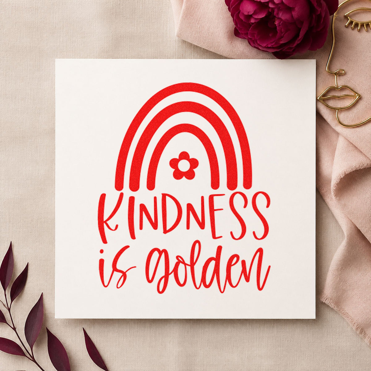 Kindness Golden Flower Rainbow rubber stamp shown in red ink, stamped for projects such as bin game labels.
