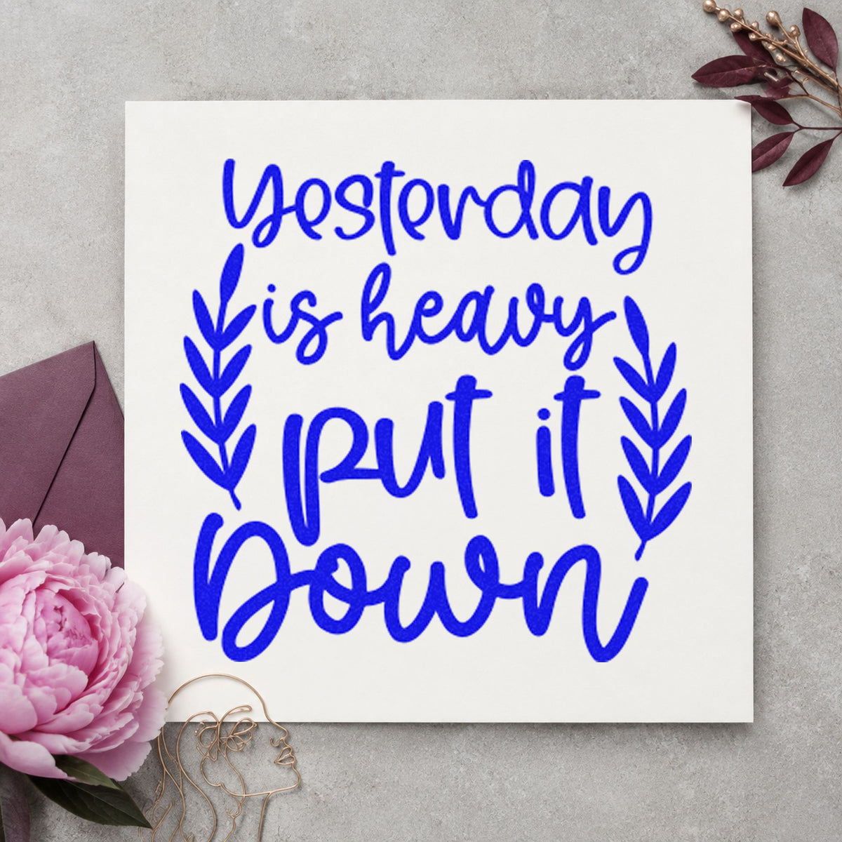 Yesterday Heavy Put Down craft stamp in blue ink on cardstock, an easy option for dust cloth printing.
