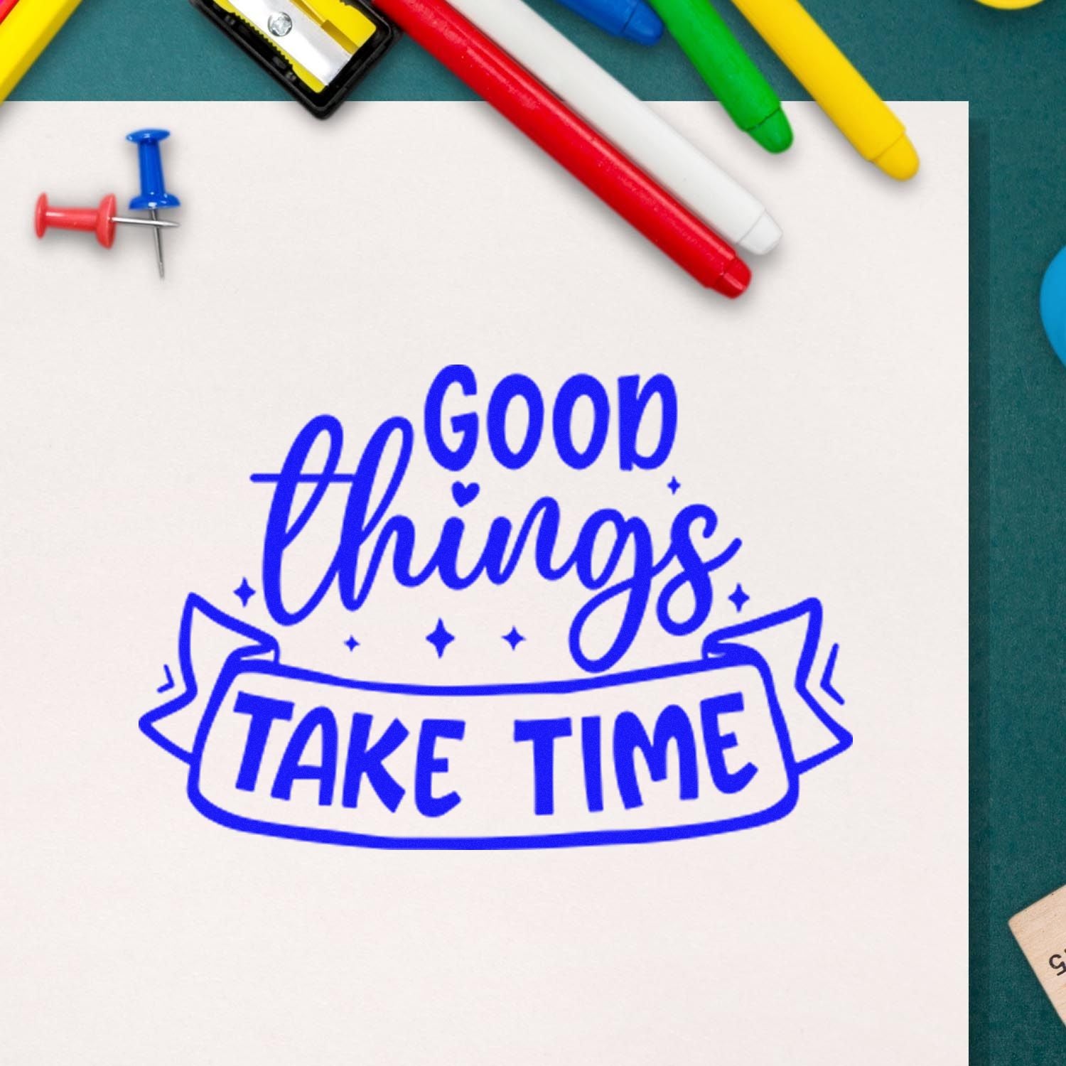 Blue rubber stamp reading Good things take time on paper, ideal for motivational planner, card-making, and craft projects.
