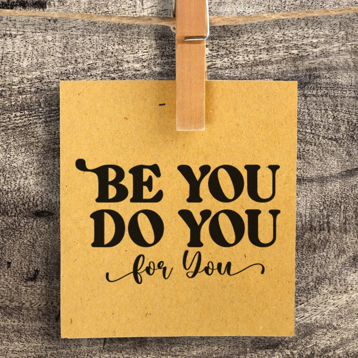 Motivational rubber stamp reading Be You Do You for You on kraft paper, perfect for handmade cards, gifts, and packaging.