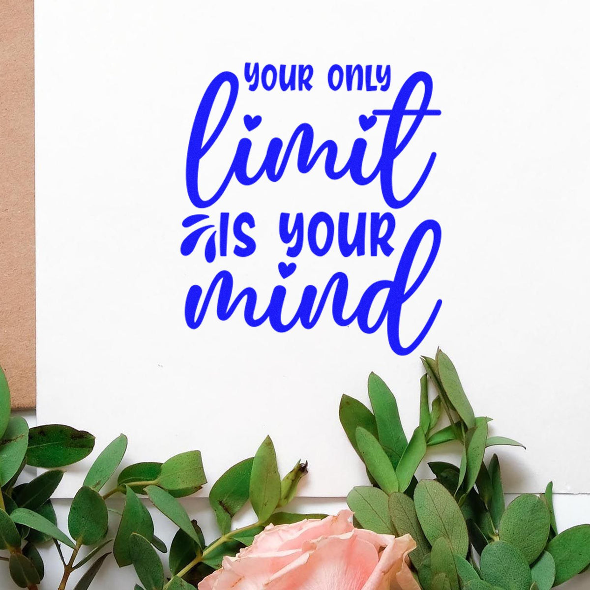 Inspirational rubber stamp design with quote Your only limit is your mind in blue script and floral accents.