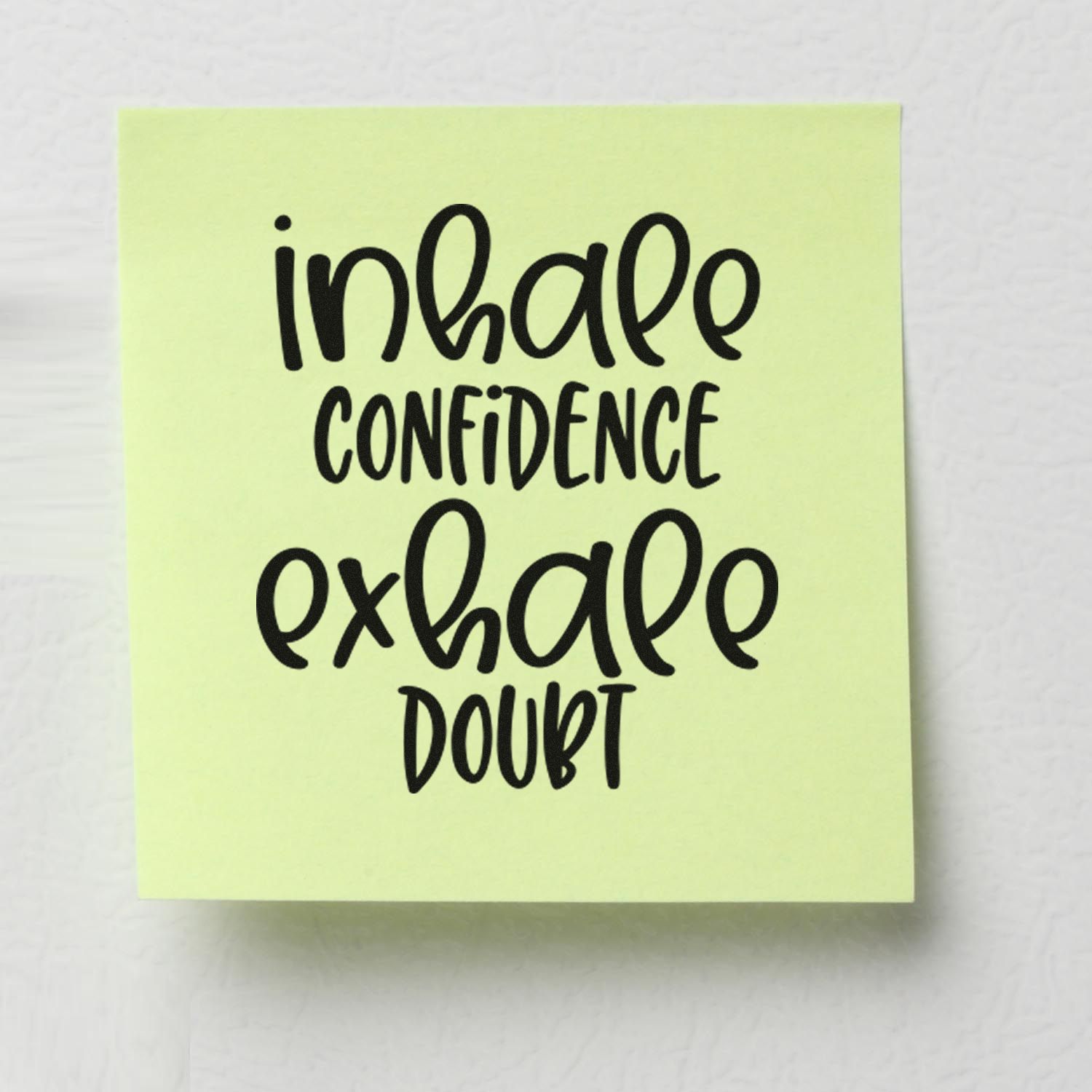 Inhale confidence, exhale doubt motivational rubber stamp design on pale yellow paper for journaling and crafting.