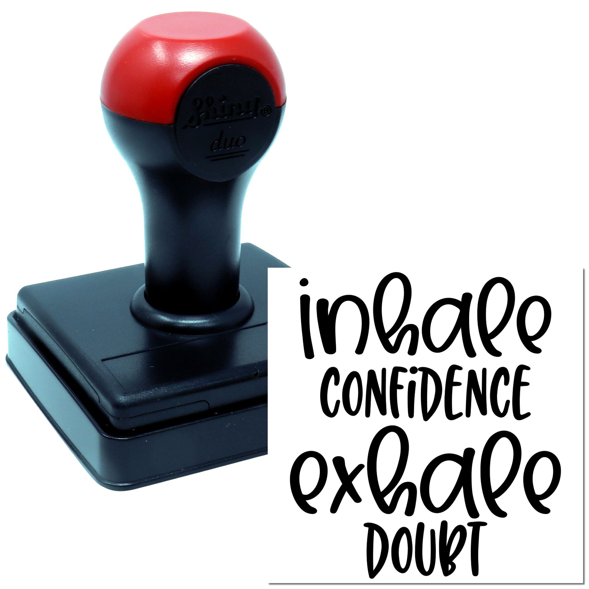 Self-inking rubber stamp with inhale confidence, exhale doubt design for motivational crafting and branding.