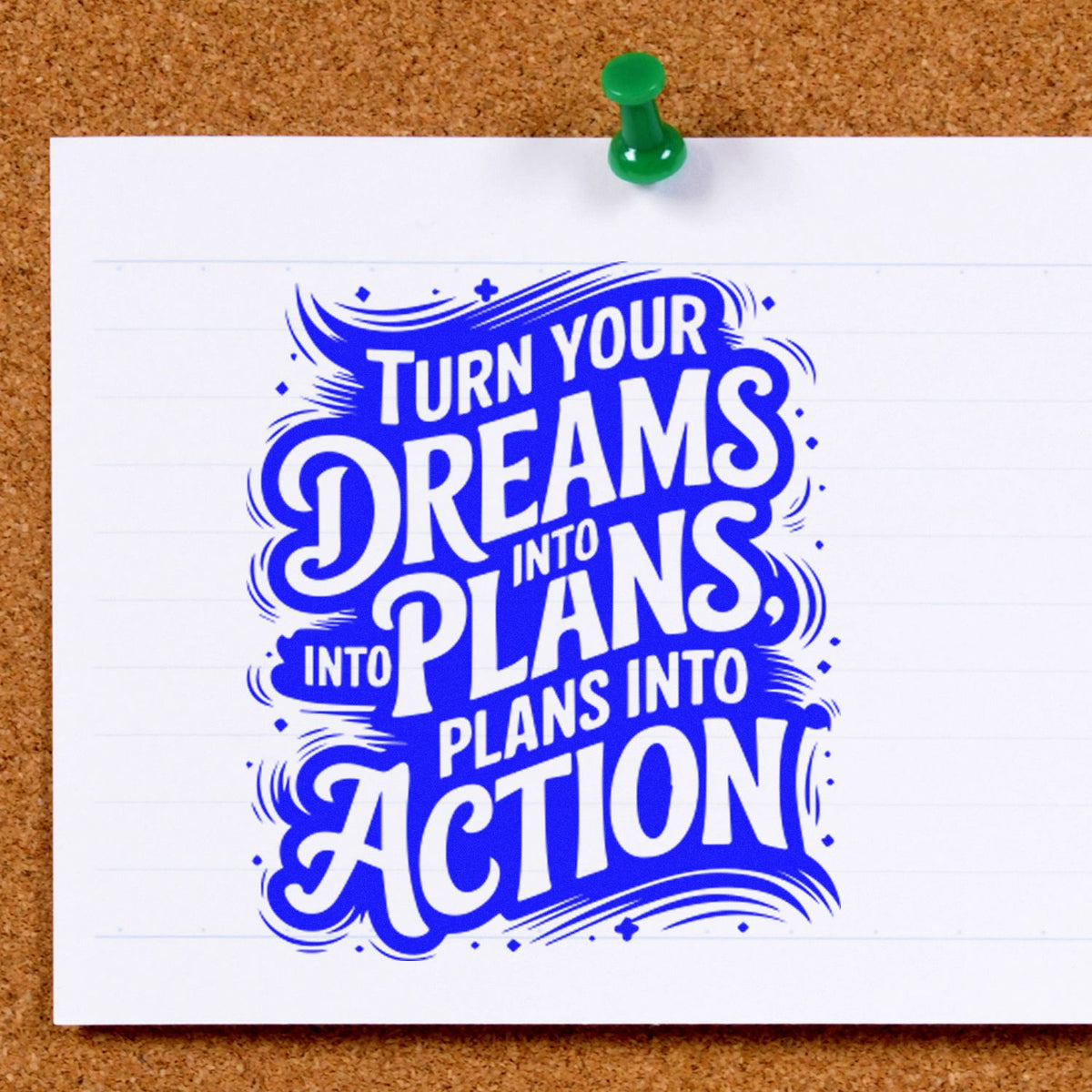 Blue motivational rubber stamp impression reading Turn your dreams into plans, into plans into action on white paper.