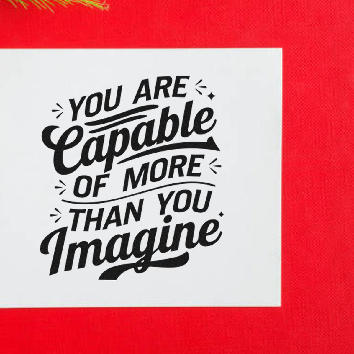 Inspirational rubber stamp design reading You are capable of more than you imagine in bold black lettering.