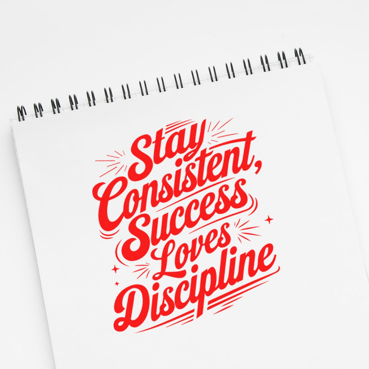 Stay Consistent, Success Loves Discipline motivational rubber stamp design on notebook page for productivity and goal setting.